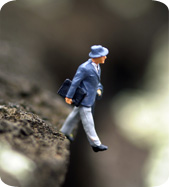 Man walking over the fiscal cliff